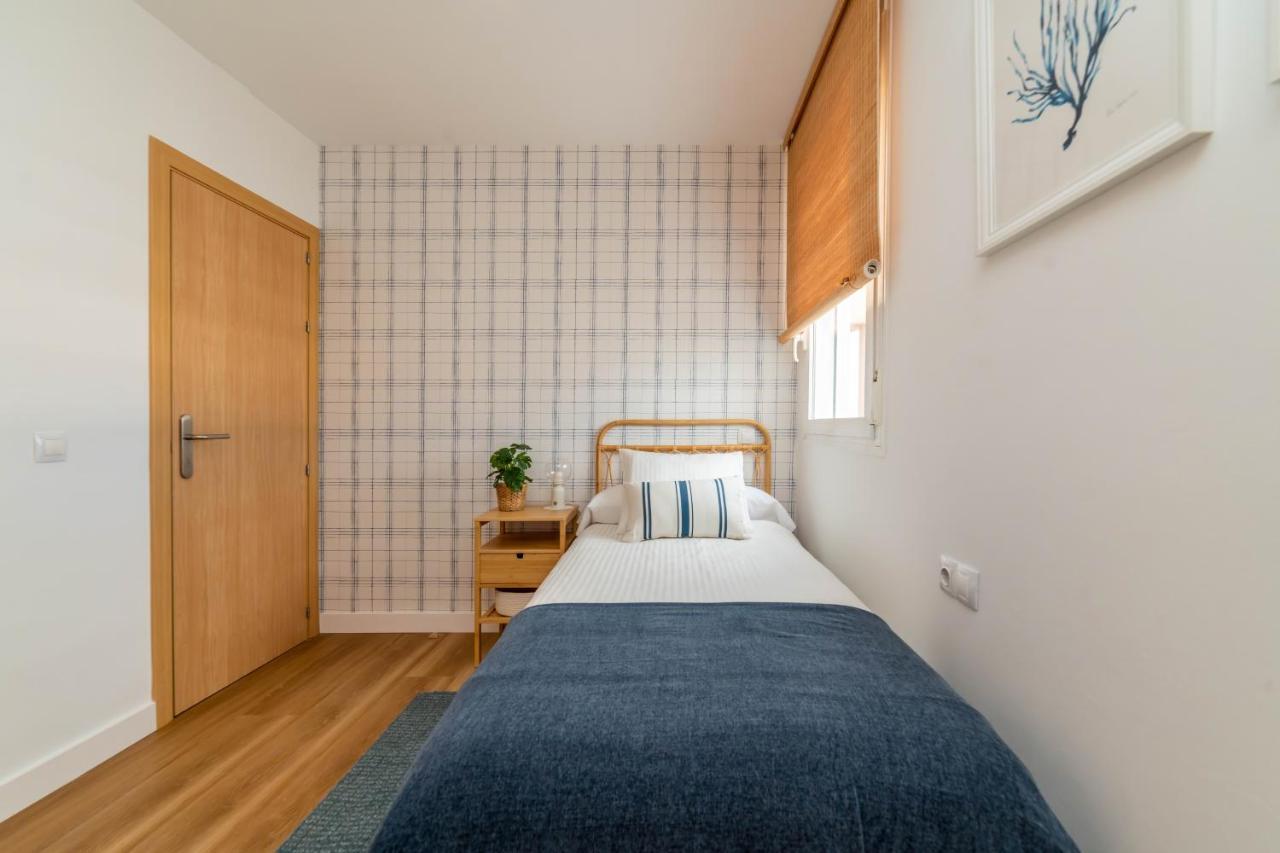 Apartment Atico Cholas By The