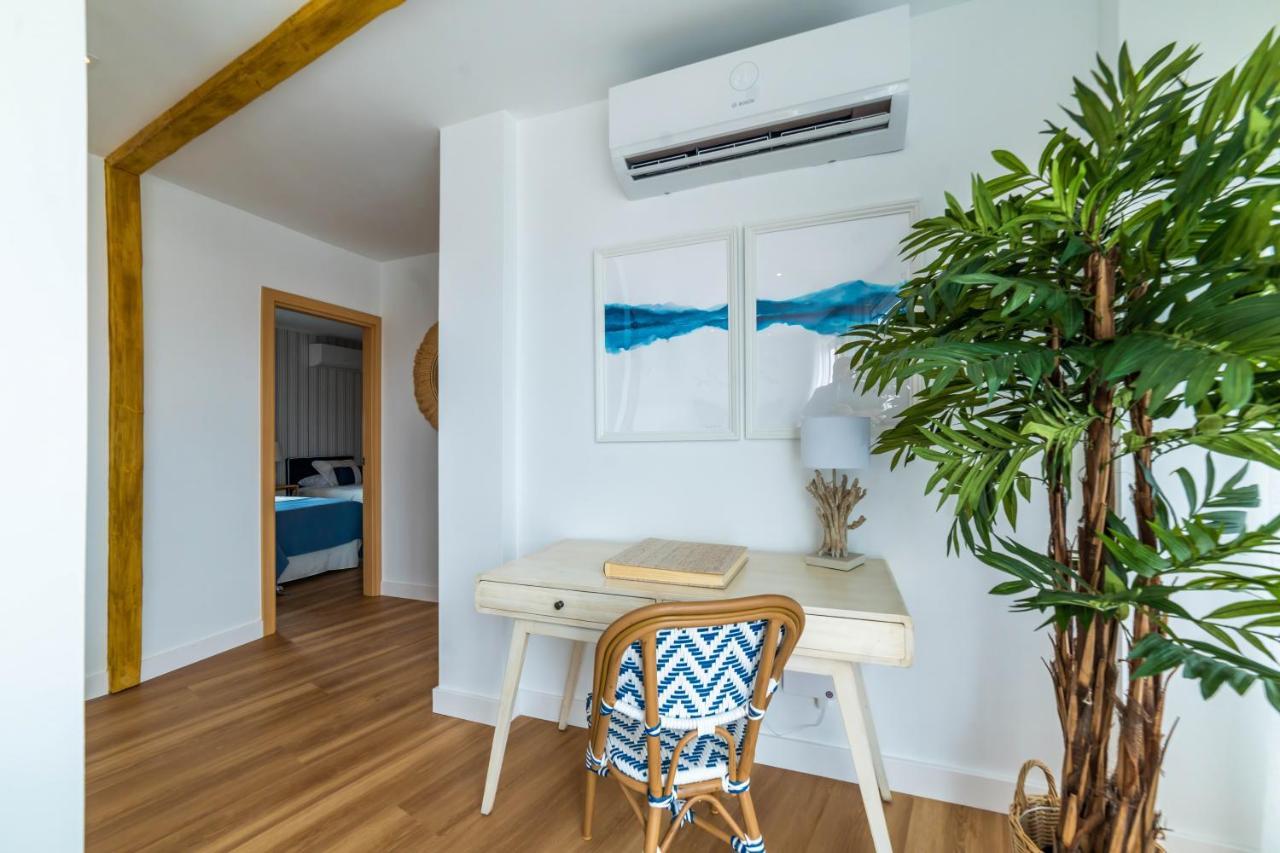 Apartment Atico Cholas By The