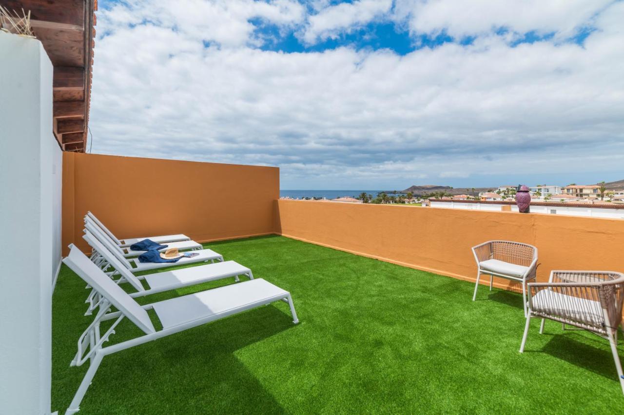 Apartment Atico Cholas By The